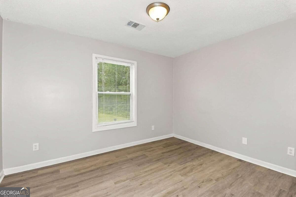4 bedroom, 3 bathroom single family residence for rent at 5730 Broadleaf Way, Atlanta, GA 30349 for $2,120 a month — photo 7