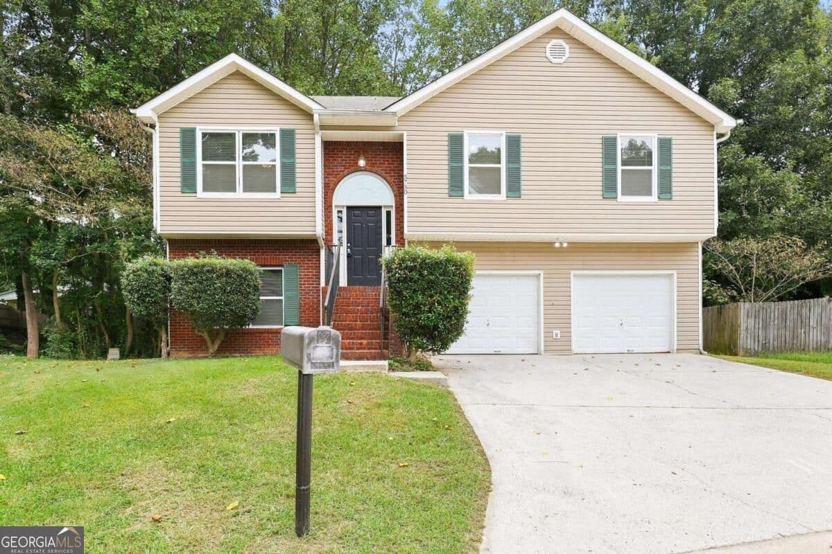 4 bedroom, 3 bathroom single family residence for rent at 5730 Broadleaf Way, Atlanta, GA 30349 for $2,120 a month — photo 1 of 17