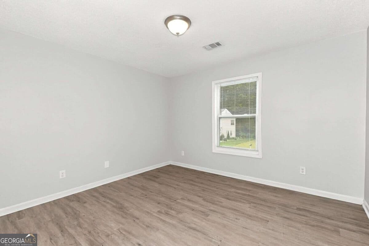 4 bedroom, 3 bathroom single family residence for rent at 5730 Broadleaf Way, Atlanta, GA 30349 for $2,120 a month — photo 8