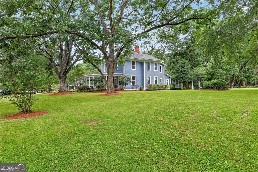5 bedroom, 2 bathroom, 3,264 sq ft single family residence for sale at 1060 Hill Street, Concord, GA 30206 — photo 4