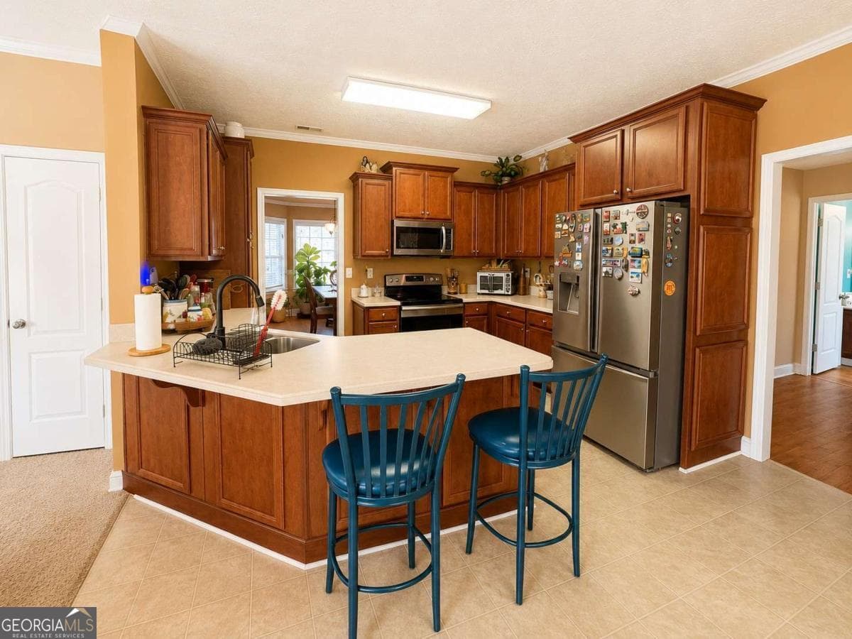5 bedroom, 4.5 bathroom, 4,233 sq ft single family residence for sale at 125 Stewart Glen Drive, Covington, GA 30014 — photo 7