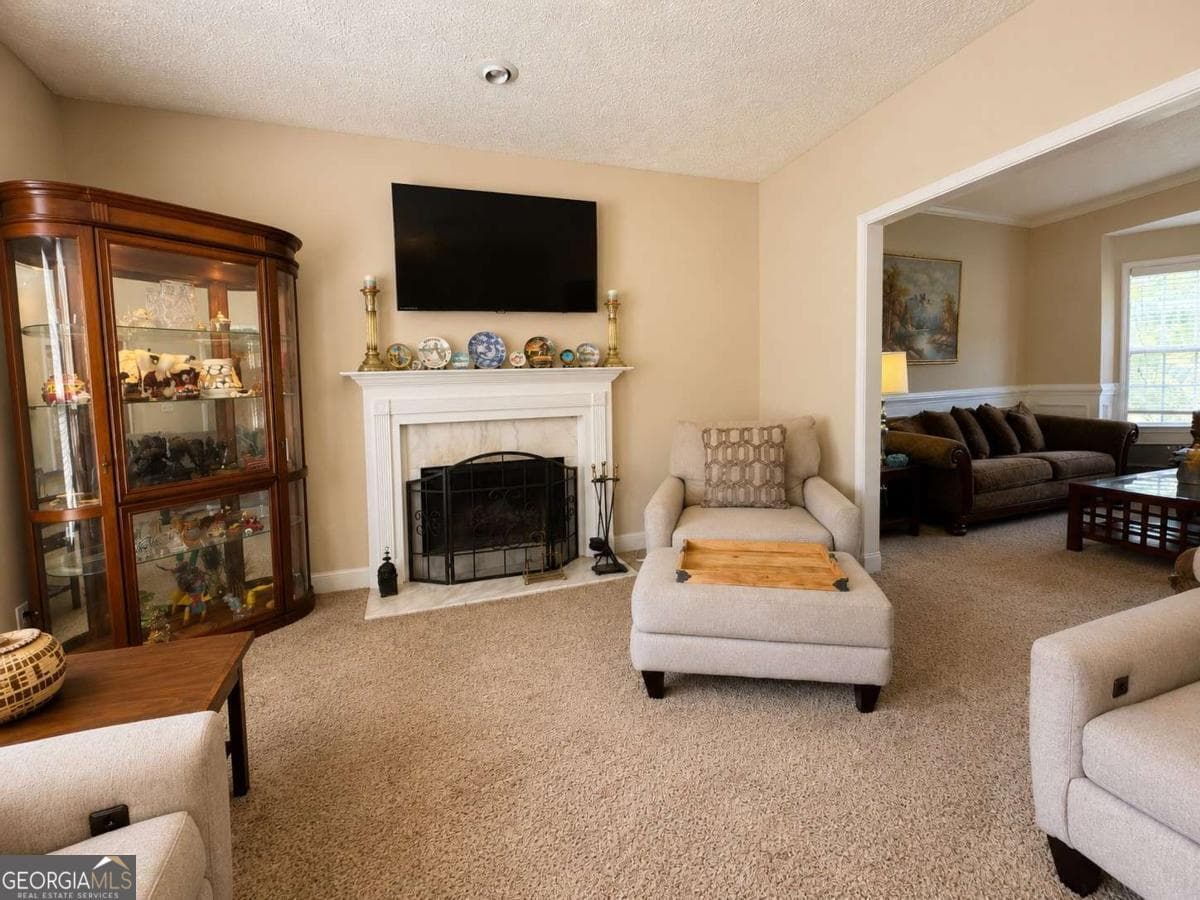 5 bedroom, 4.5 bathroom, 4,233 sq ft single family residence for sale at 125 Stewart Glen Drive, Covington, GA 30014 — photo 5