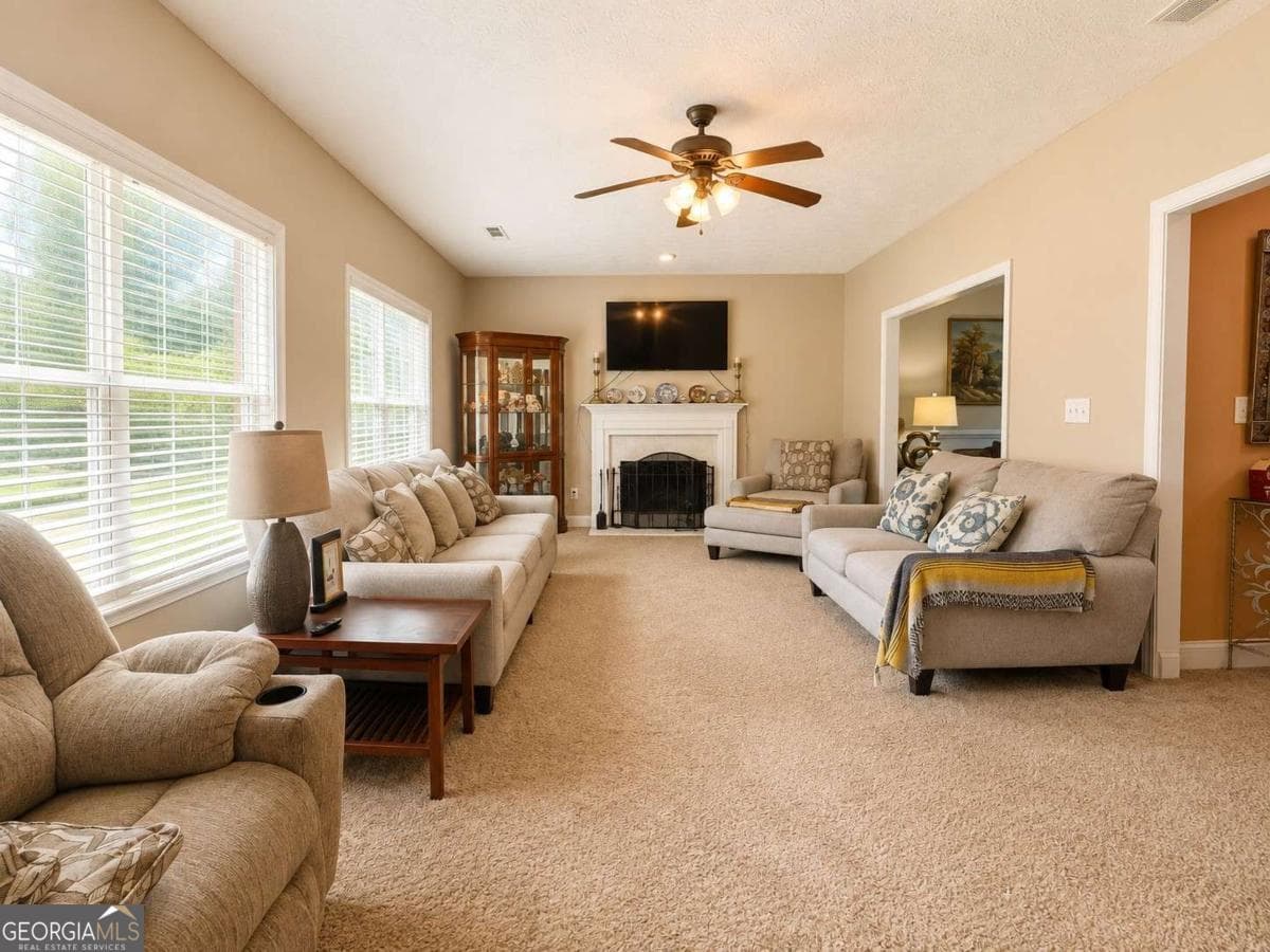 5 bedroom, 4.5 bathroom, 4,233 sq ft single family residence for sale at 125 Stewart Glen Drive, Covington, GA 30014 — photo 4