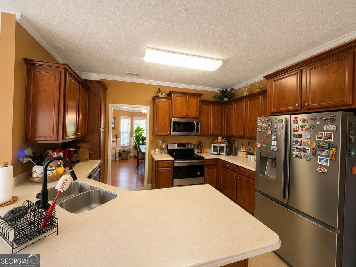 5 bedroom, 4.5 bathroom, 4,233 sq ft single family residence for sale at 125 Stewart Glen Drive, Covington, GA 30014 — photo 8