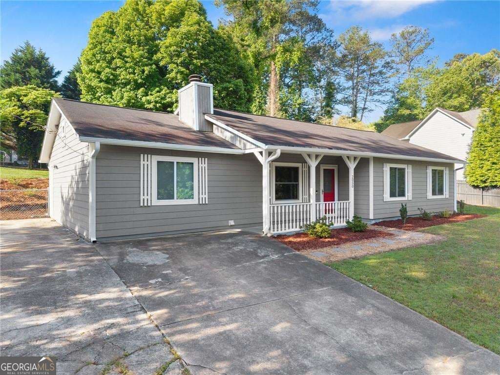 4 bedroom, 2 bathroom single family residence for rent at 2050 Shaffer Road, Cumming, GA 30041 for $2,600 a month — photo 1 of 31