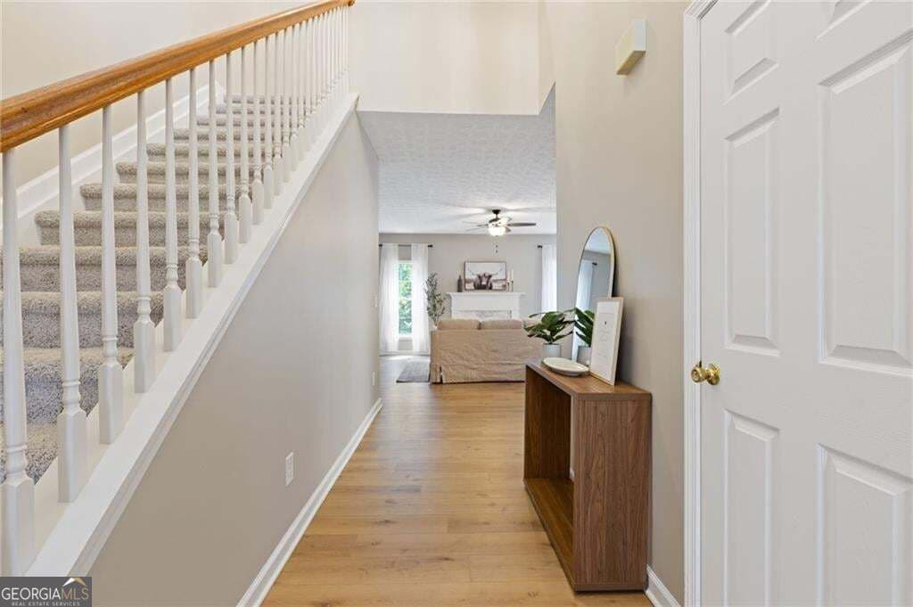 4 bedroom, 3.5 bathroom, 2,758 sq ft single family residence for sale at 1755 Patrick Mill Place, Buford, GA 30518 — photo 4
