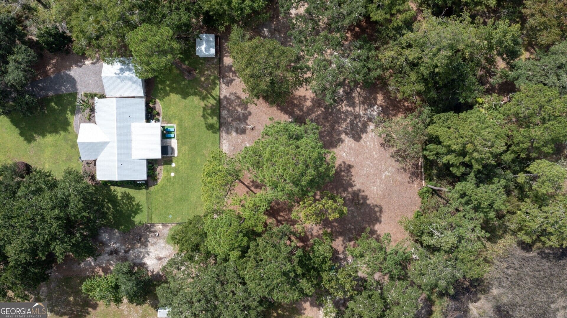 3 bedroom, 2 bathroom, 1,450 sq ft single family residence for sale at 2215 Oscar Road, White Oak, GA 31568 — photo 5