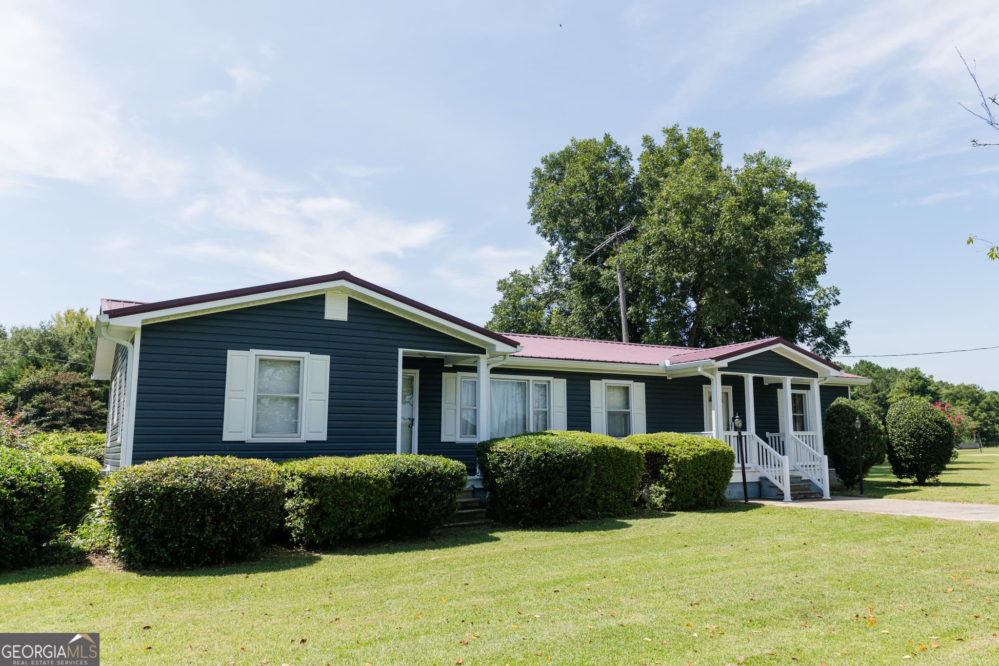 3 bedroom, 2 bathroom, 1,572 sq ft single family residence for sale at 1364 Tommy Purvis Jr Road, Reynolds, GA 31076 — photo 2