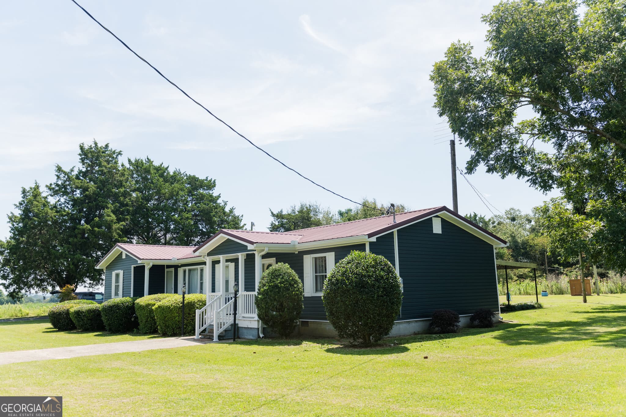 3 bedroom, 2 bathroom, 1,572 sq ft single family residence for sale at 1364 Tommy Purvis Jr Road, Reynolds, GA 31076 — photo 3