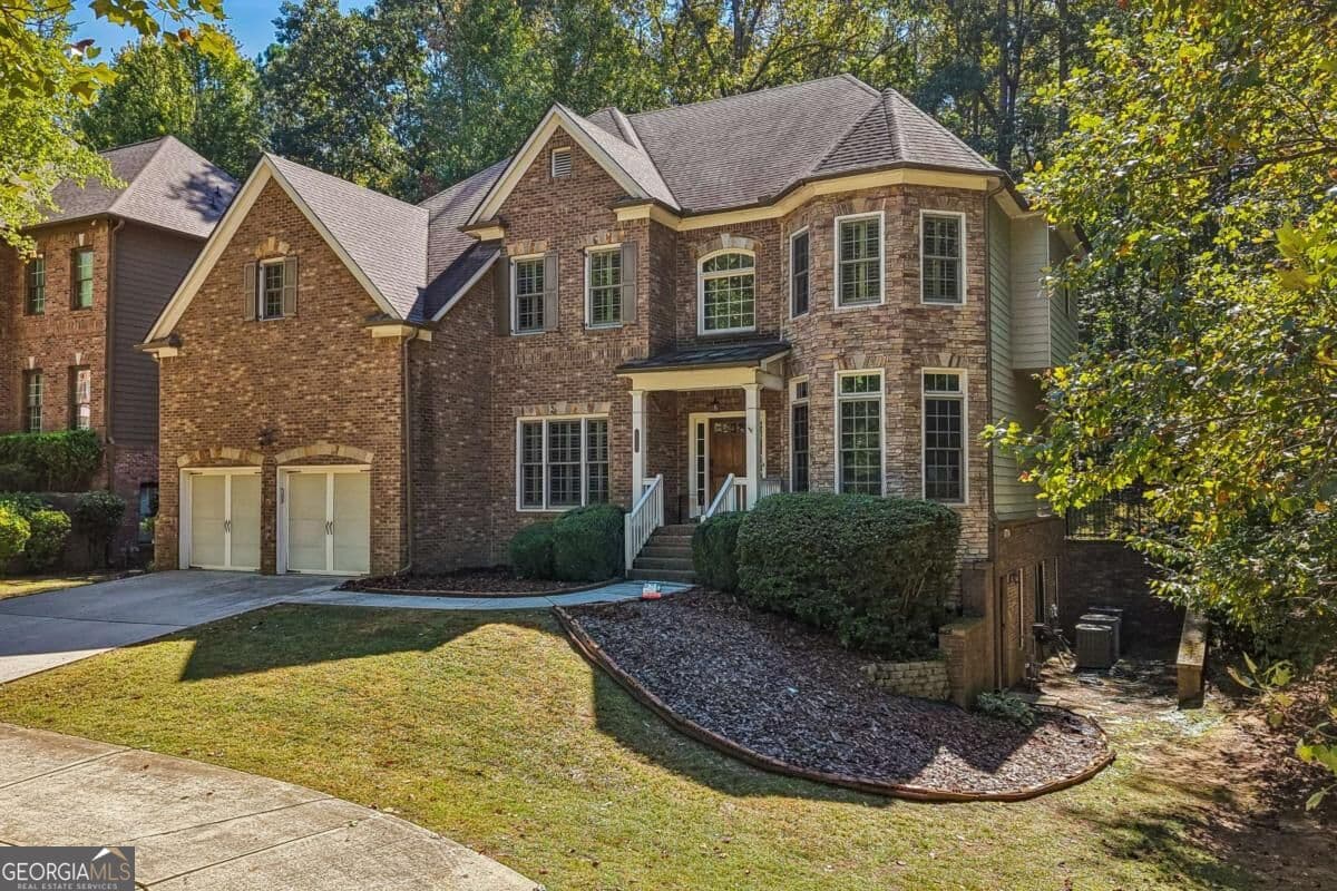 5 bedroom, 5 bathroom, 6,328 sq ft single family residence for sale at 450 Cooper Woods Court, Smyrna, GA 30082 — photo 2
