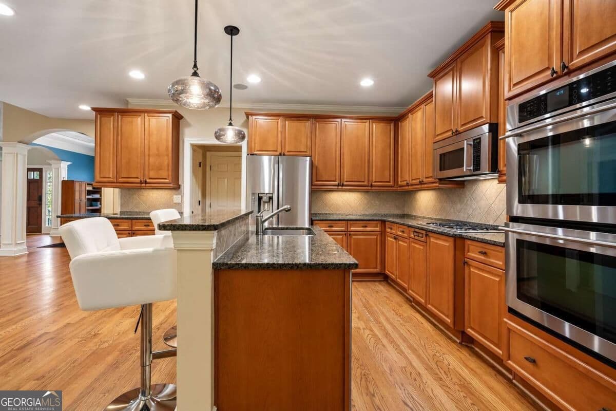 5 bedroom, 5 bathroom, 6,328 sq ft single family residence for sale at 450 Cooper Woods Court, Smyrna, GA 30082 — photo 7