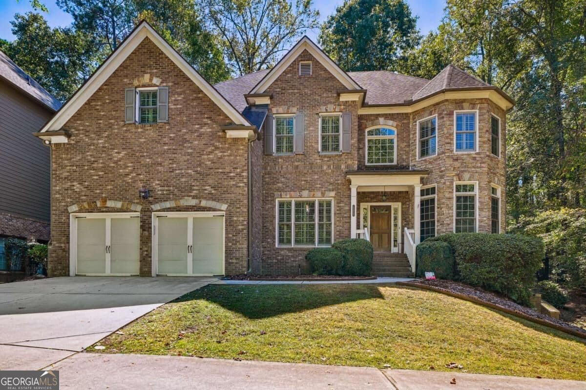 5 bedroom, 5 bathroom, 6,328 sq ft single family residence for sale at 450 Cooper Woods Court, Smyrna, GA 30082 — photo 1 of 47