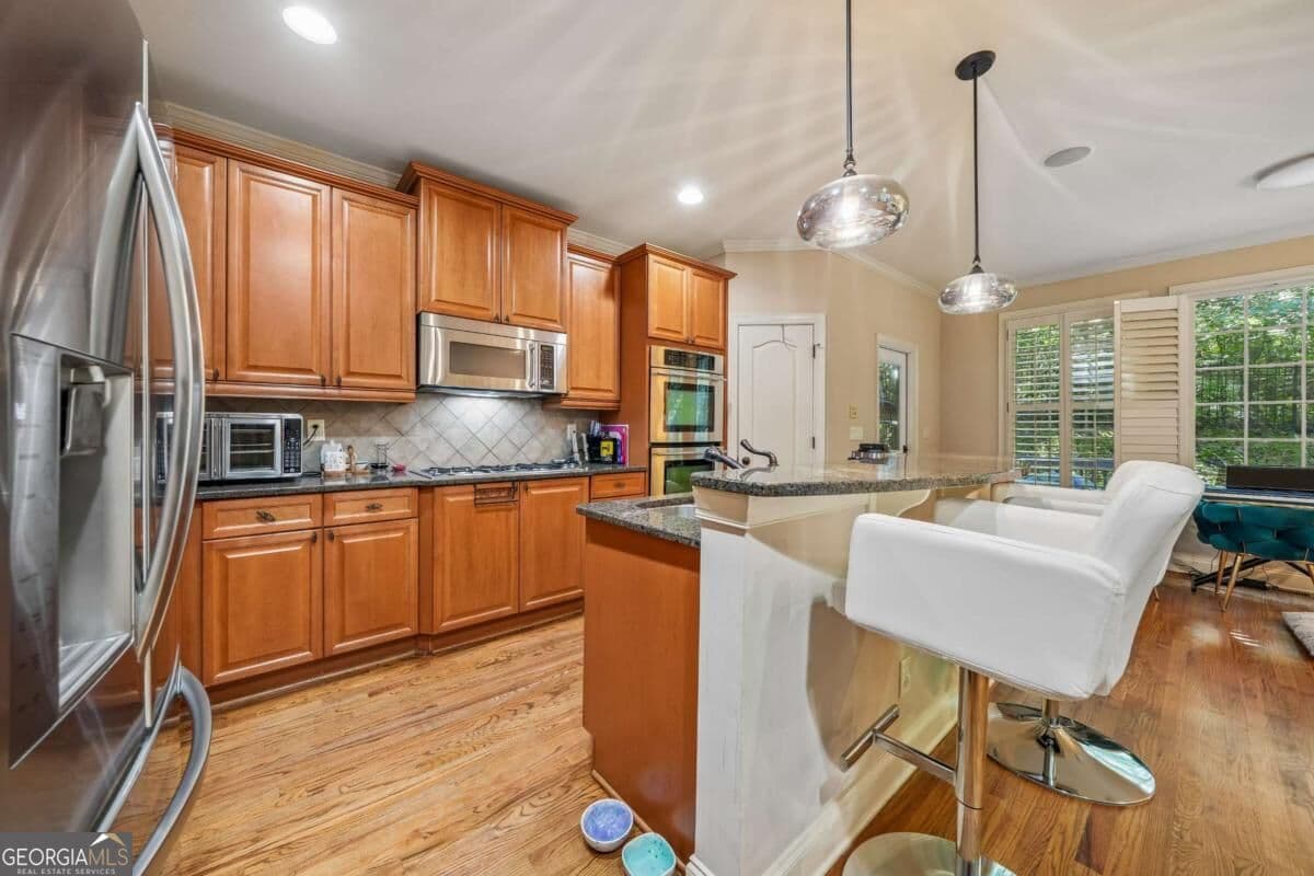 5 bedroom, 5 bathroom, 6,328 sq ft single family residence for sale at 450 Cooper Woods Court, Smyrna, GA 30082 — photo 9