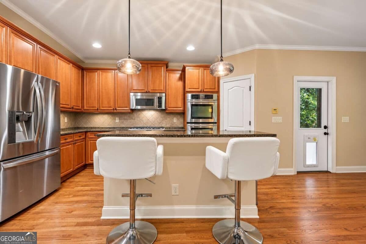 5 bedroom, 5 bathroom, 6,328 sq ft single family residence for sale at 450 Cooper Woods Court, Smyrna, GA 30082 — photo 8