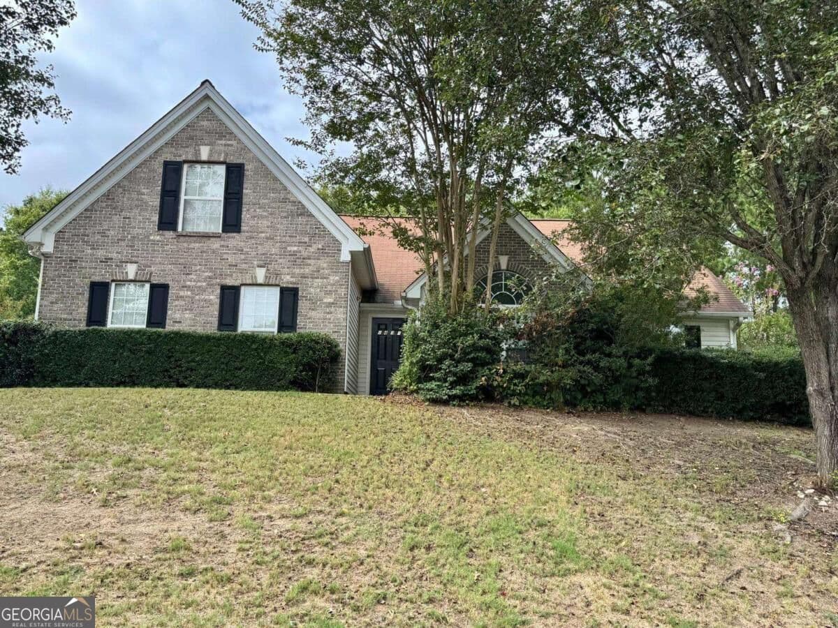 4 bedroom, 2 bathroom single family residence for sale at 1431 Log Cabin Lane, Lawrenceville, GA 30045 — photo 7