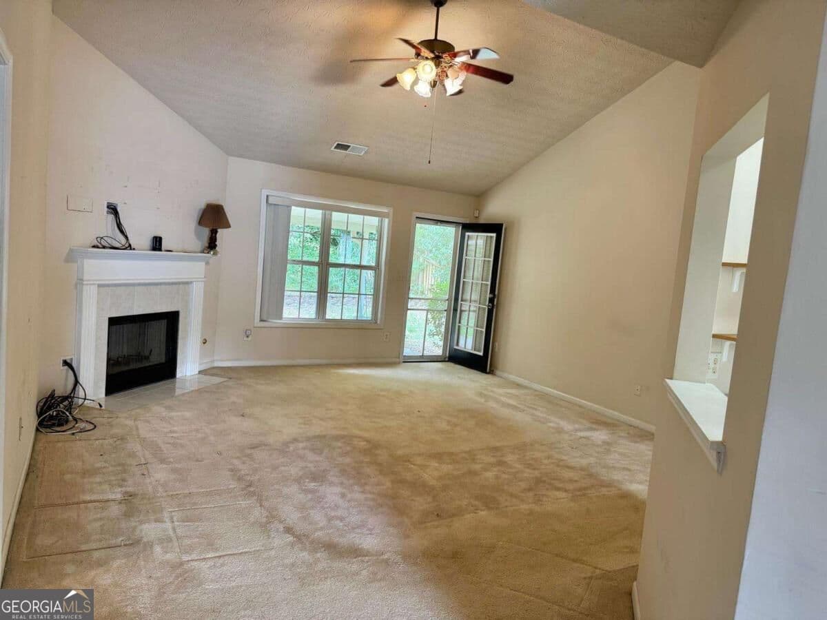 4 bedroom, 2 bathroom single family residence for sale at 1431 Log Cabin Lane, Lawrenceville, GA 30045 — photo 3