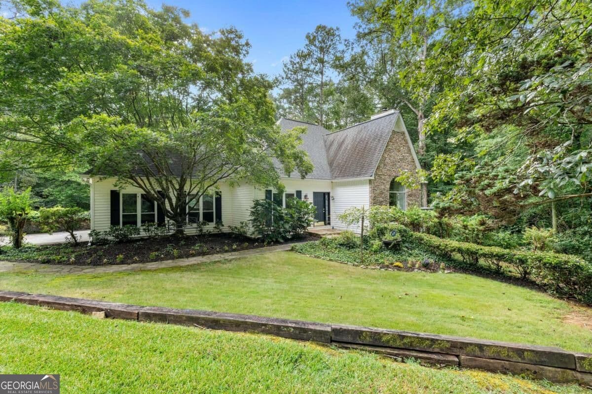 5 bedroom, 3 bathroom, 4,200 sq ft single family residence for sale at 5310 Creek Indian Trail, Douglasville, GA 30135 — photo 4