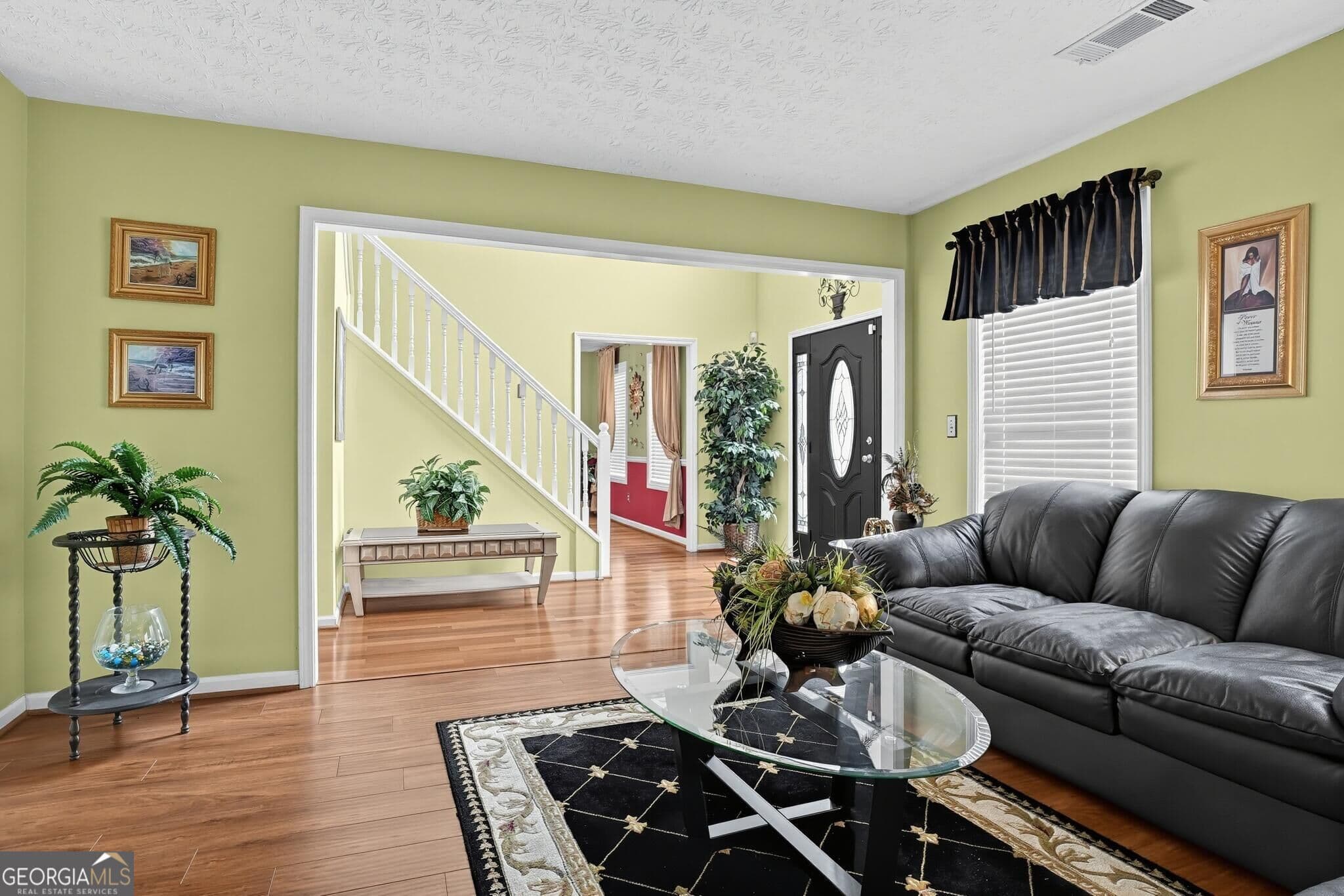 4 bedroom, 2.5 bathroom, 2,901 sq ft single family residence for sale at 1971 Hillspring Lane, Lithonia, GA 30058 — photo 7