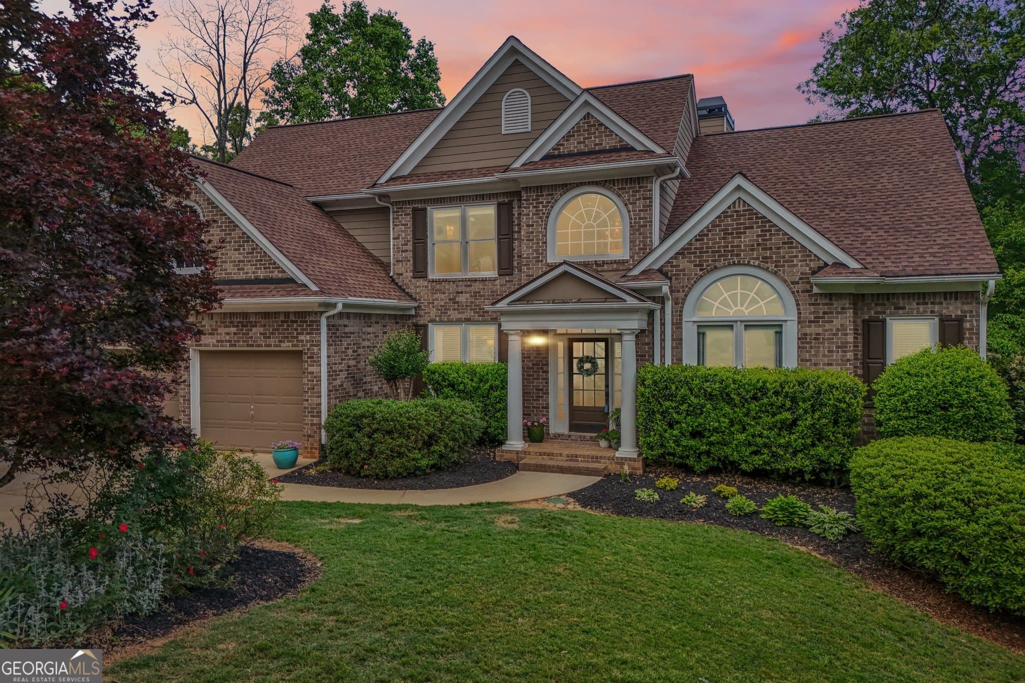 6 bedroom, 5 bathroom, 4,854 sq ft single family residence for sale at 5980 Wilmington Court, Cumming, GA 30040 — photo 2