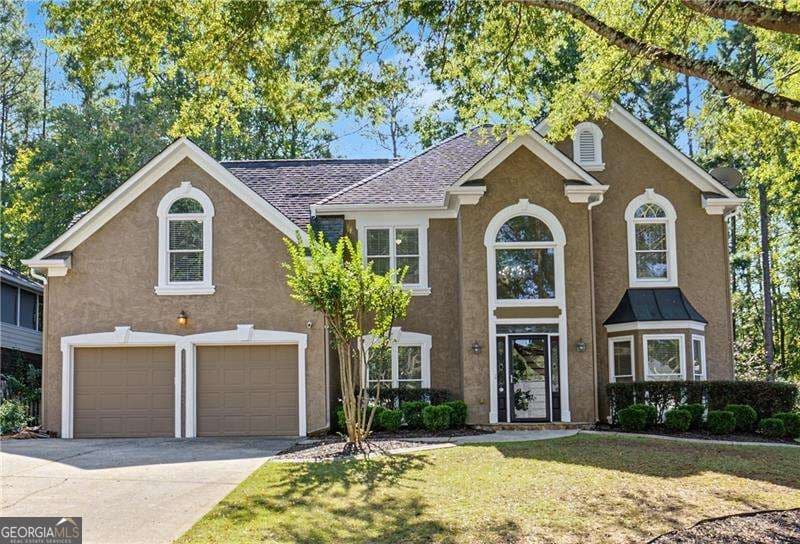 4 bedroom, 2.5 bathroom, 3,065 sq ft single family residence for sale at 343 Ironhill Trace, Woodstock, GA 30189 — photo 2