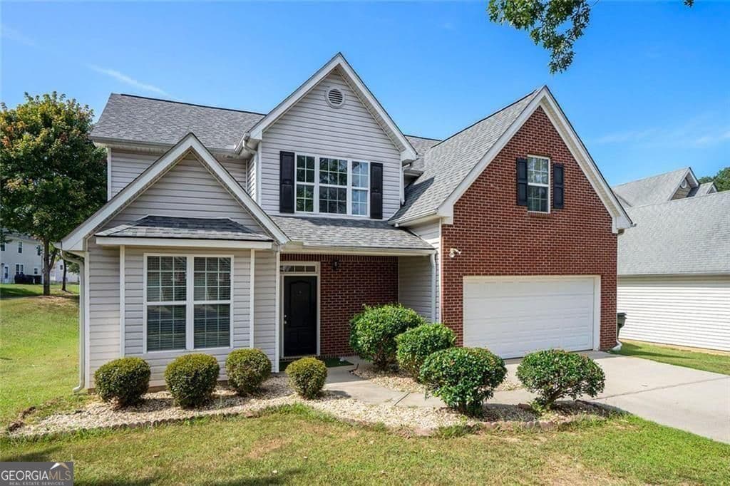4 bedroom, 2.5 bathroom, 2,217 sq ft single family residence for sale at 2289 Pate Brook Road, Snellville, GA 30078 — photo 2