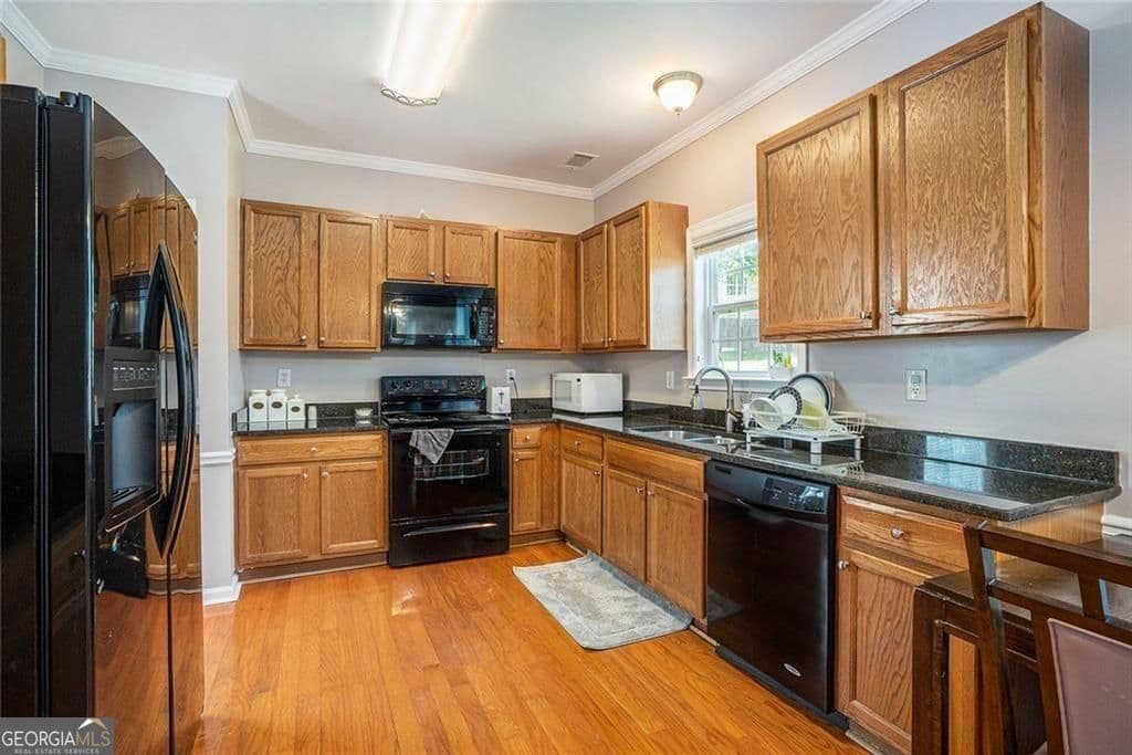 4 bedroom, 2.5 bathroom, 2,217 sq ft single family residence for sale at 2289 Pate Brook Road, Snellville, GA 30078 — photo 7