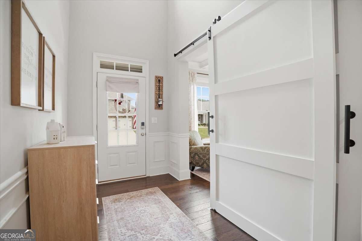 5 bedroom, 4.5 bathroom, 3,218 sq ft single family residence for sale at 6265 Privet Way, Cumming, GA 30028 — photo 7