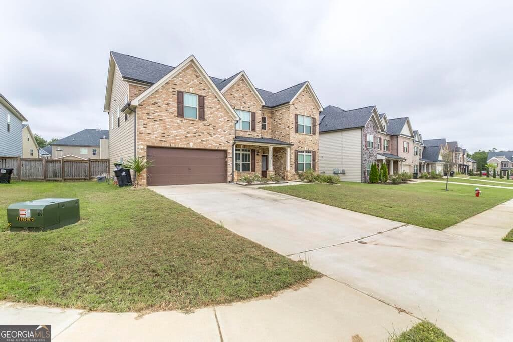 5 bedroom, 3 bathroom, 2,683 sq ft single family residence for sale at 109 Lacey Oak Lane, Bonaire, GA 31005 — photo 3