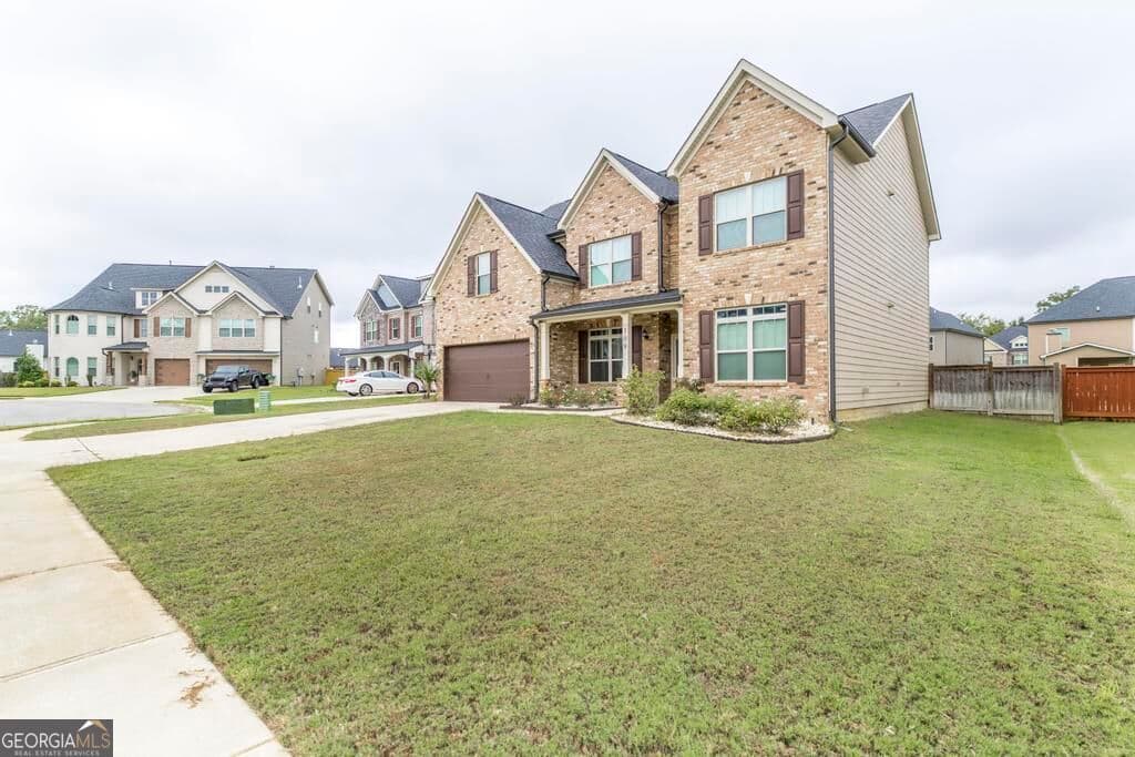 5 bedroom, 3 bathroom, 2,683 sq ft single family residence for sale at 109 Lacey Oak Lane, Bonaire, GA 31005 — photo 4