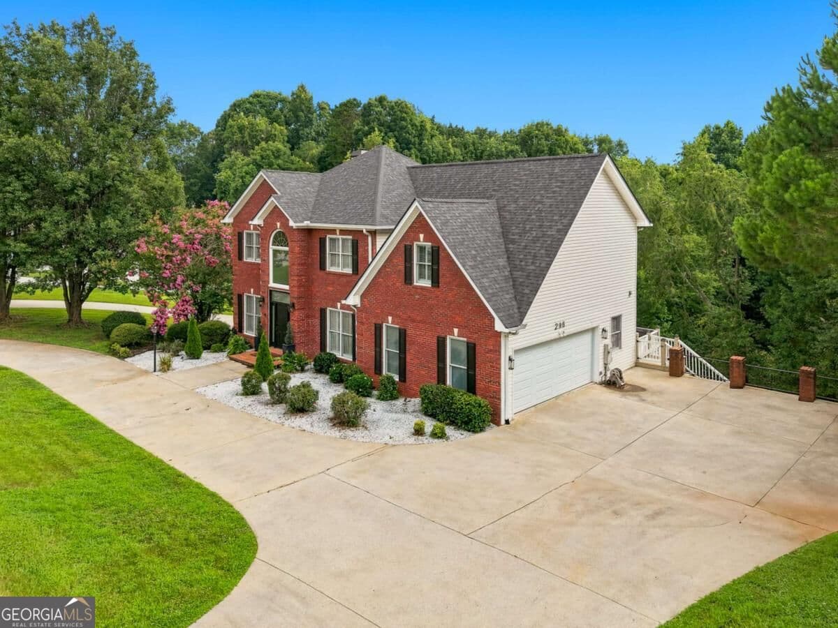 4 bedroom, 3.5 bathroom, 3,992 sq ft single family residence for sale at 296 Cloudland Road, Dahlonega, GA 30533 — photo 2