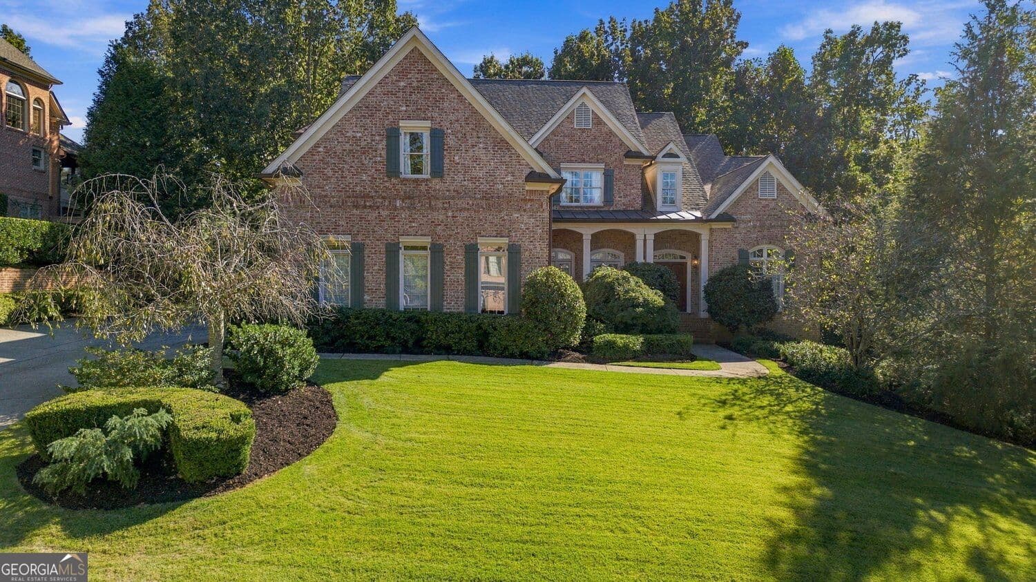 5 bedroom, 5.5 bathroom, 6,013 sq ft single family residence for sale at 9055 Bedford Way, Suwanee, GA 30024