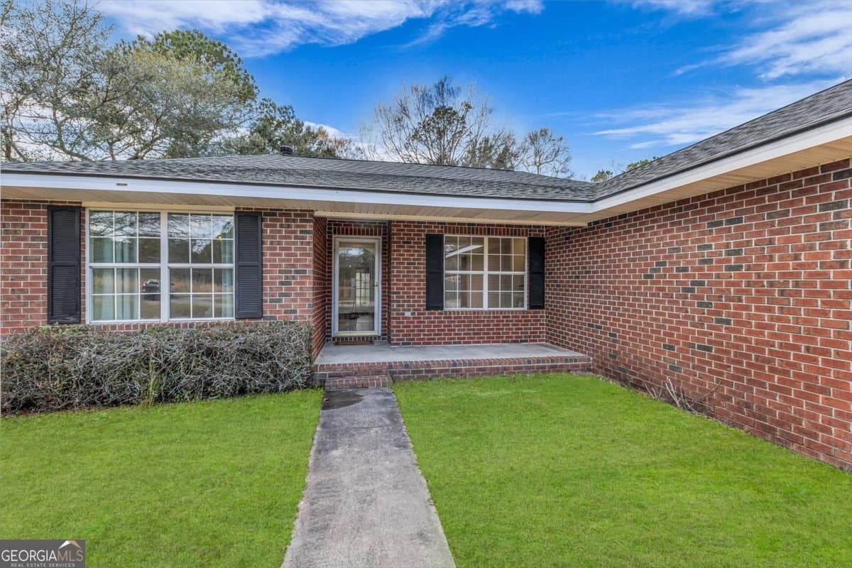 4 bedroom, 2 bathroom, 1,901 sq ft single family residence for sale at 153 Hughes Drive, Midway, GA 31320 — photo 5