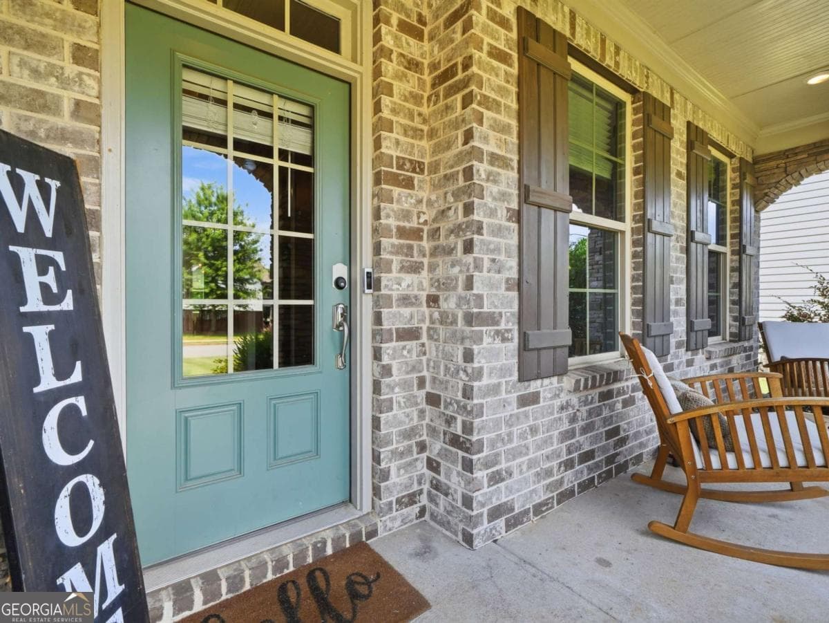 5 bedroom, 4 bathroom, 3,706 sq ft single family residence for sale at 542 Flyingbolt Run, Canton, GA 30115 — photo 2