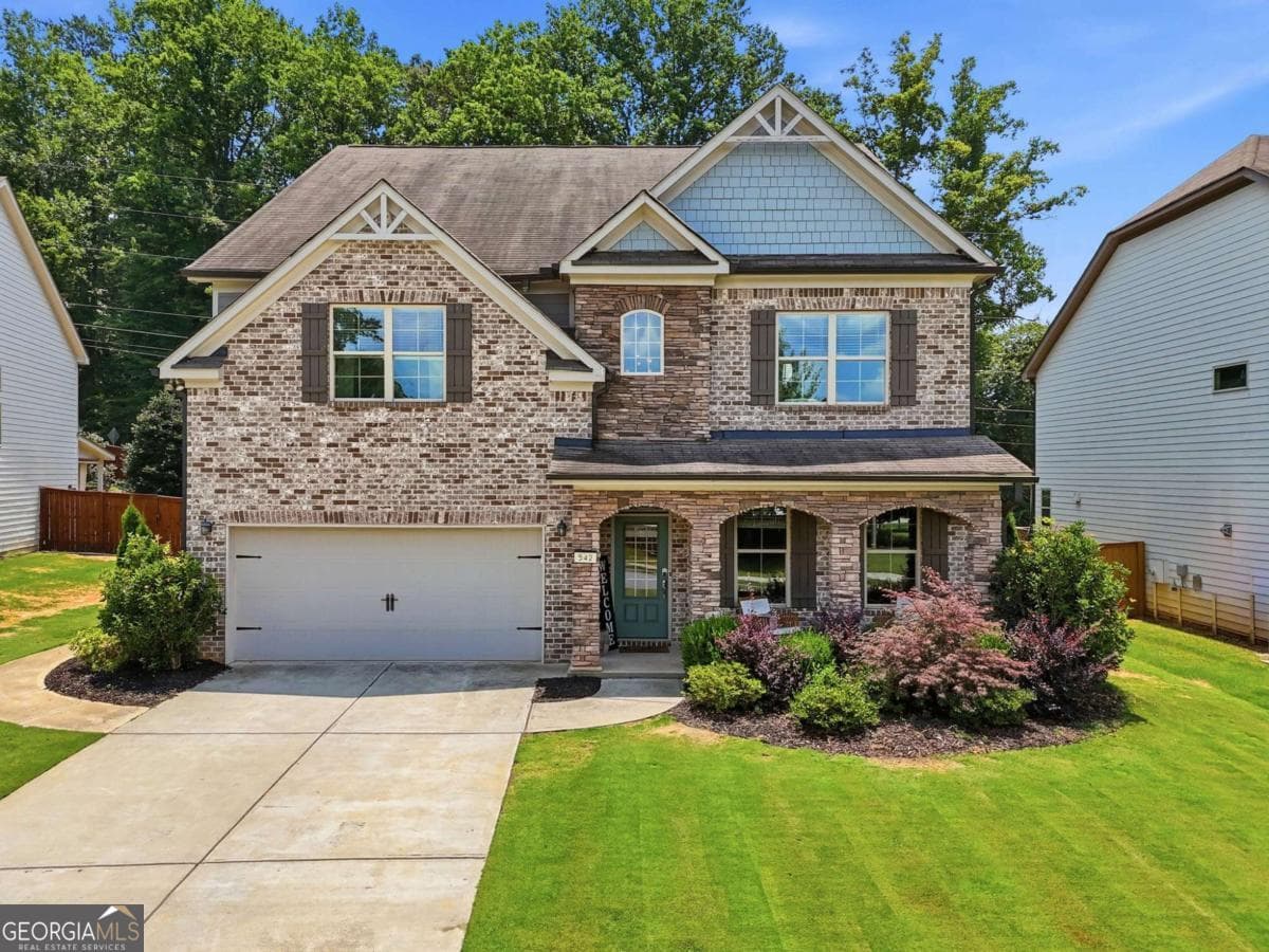 5 bedroom, 4 bathroom, 3,706 sq ft single family residence for sale at 542 Flyingbolt Run, Canton, GA 30115 — photo 1 of 60