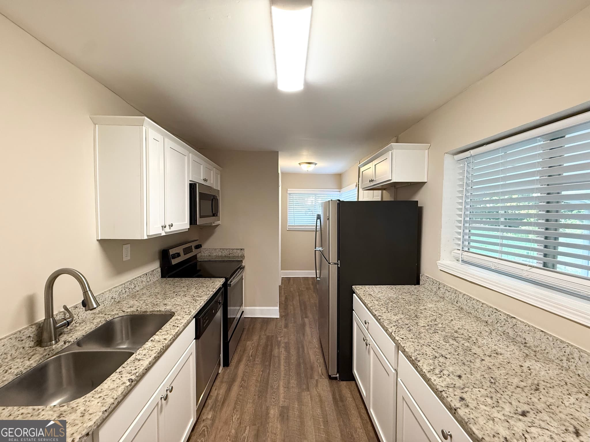 3 bedroom, 1 bathroom, 1,156 sq ft single family residence for sale at 1743 Carter Circle, East Point, GA 30344 — photo 4