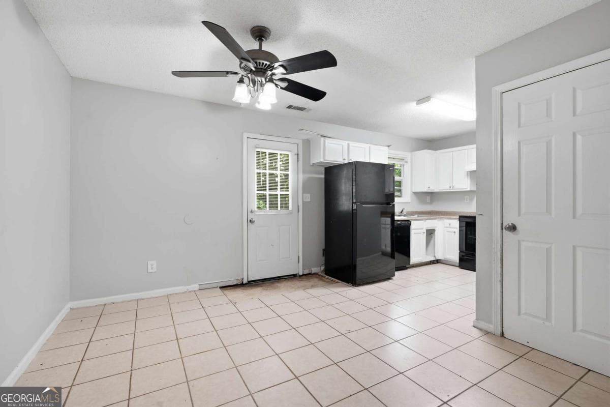 5 bedroom, 2.5 bathroom, 1,588 sq ft single family residence for sale at 6013 Radford Drive, Riverdale, GA 30296 — photo 6