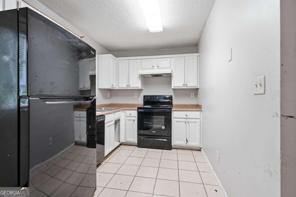5 bedroom, 2.5 bathroom, 1,588 sq ft single family residence for sale at 6013 Radford Drive, Riverdale, GA 30296 — photo 7