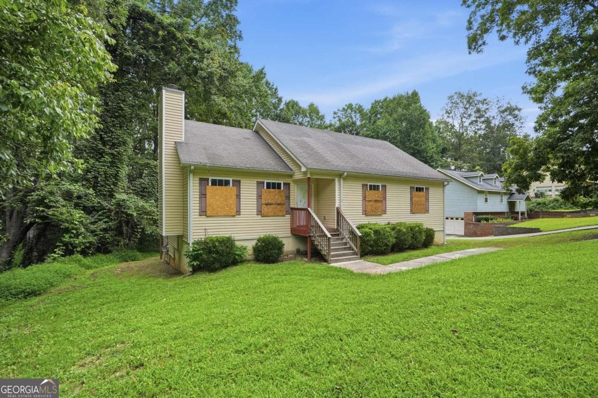 5 bedroom, 2.5 bathroom, 1,588 sq ft single family residence for sale at 6013 Radford Drive, Riverdale, GA 30296 — photo 3