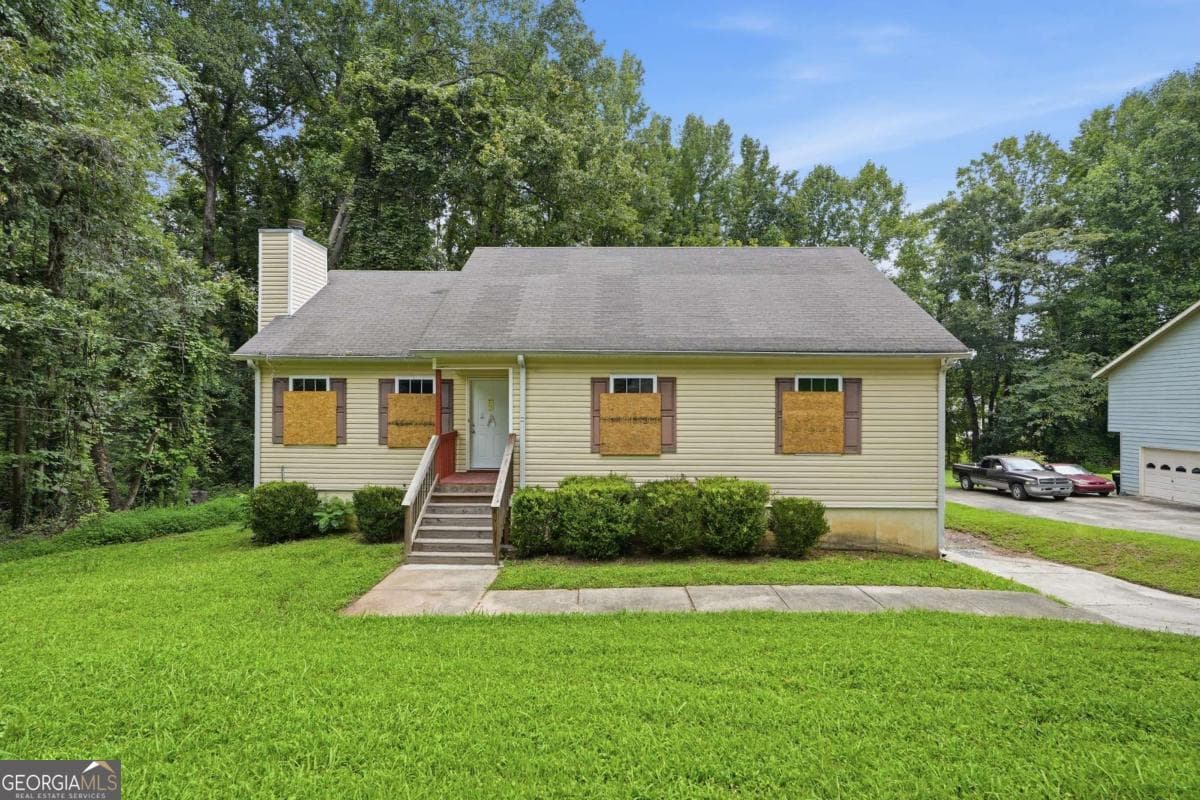 5 bedroom, 2.5 bathroom, 1,588 sq ft single family residence for sale at 6013 Radford Drive, Riverdale, GA 30296
