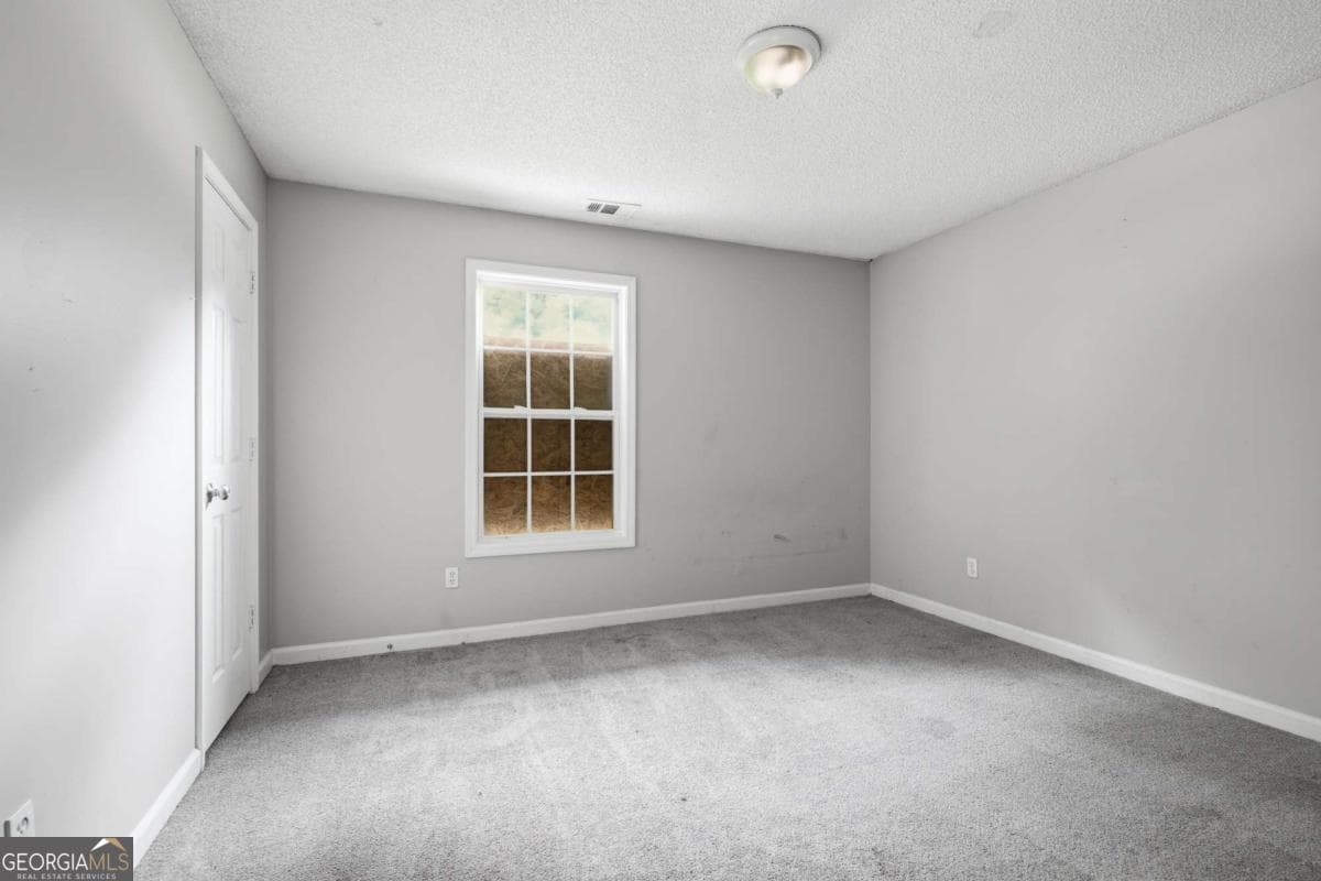 5 bedroom, 2.5 bathroom, 1,588 sq ft single family residence for sale at 6013 Radford Drive, Riverdale, GA 30296 — photo 10