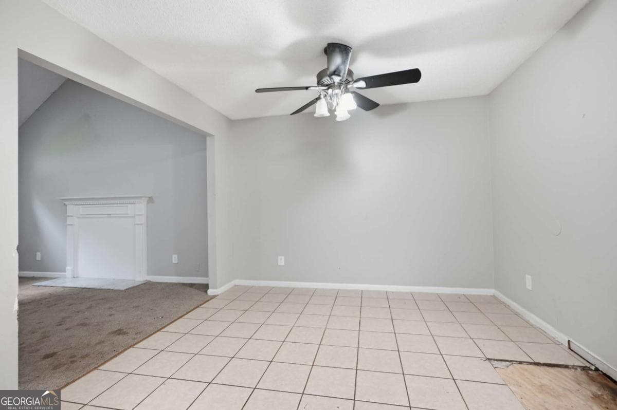 5 bedroom, 2.5 bathroom, 1,588 sq ft single family residence for sale at 6013 Radford Drive, Riverdale, GA 30296 — photo 4
