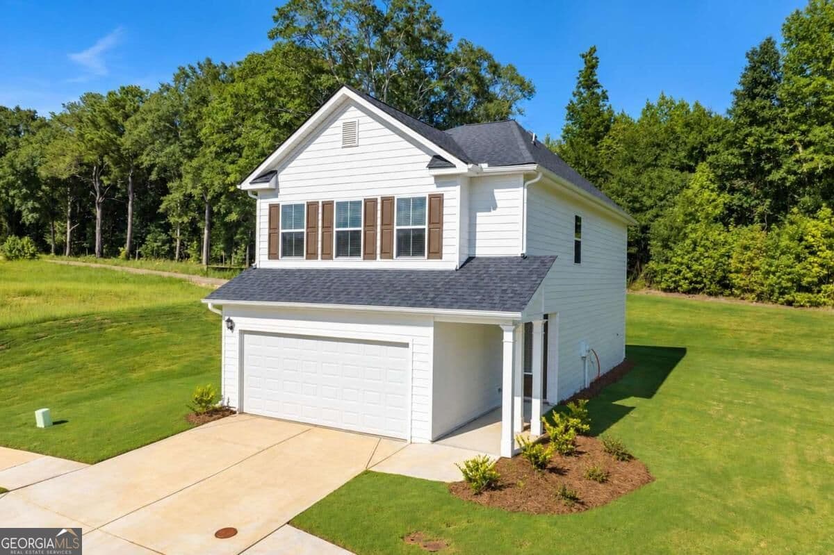 4 bedroom, 2.5 bathroom, 1,767 sq ft single family residence for sale at 1150 Earlywood Way, Monroe, GA 30655 — photo 2