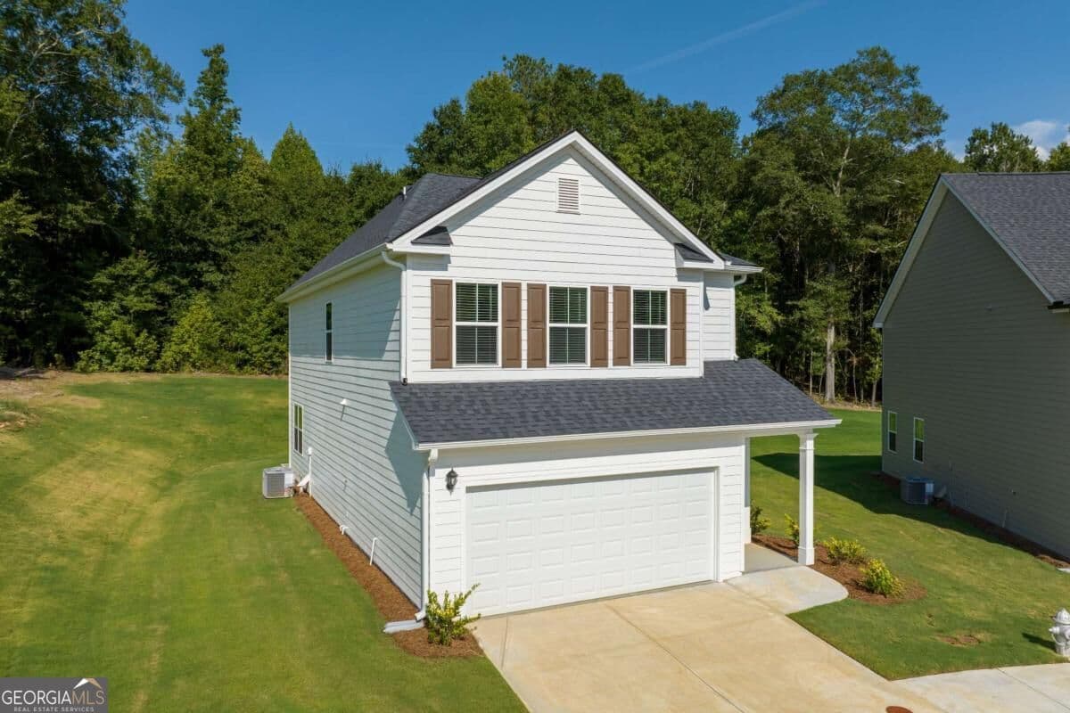 4 bedroom, 2.5 bathroom, 1,767 sq ft single family residence for sale at 1150 Earlywood Way, Monroe, GA 30655 — photo 1 of 43