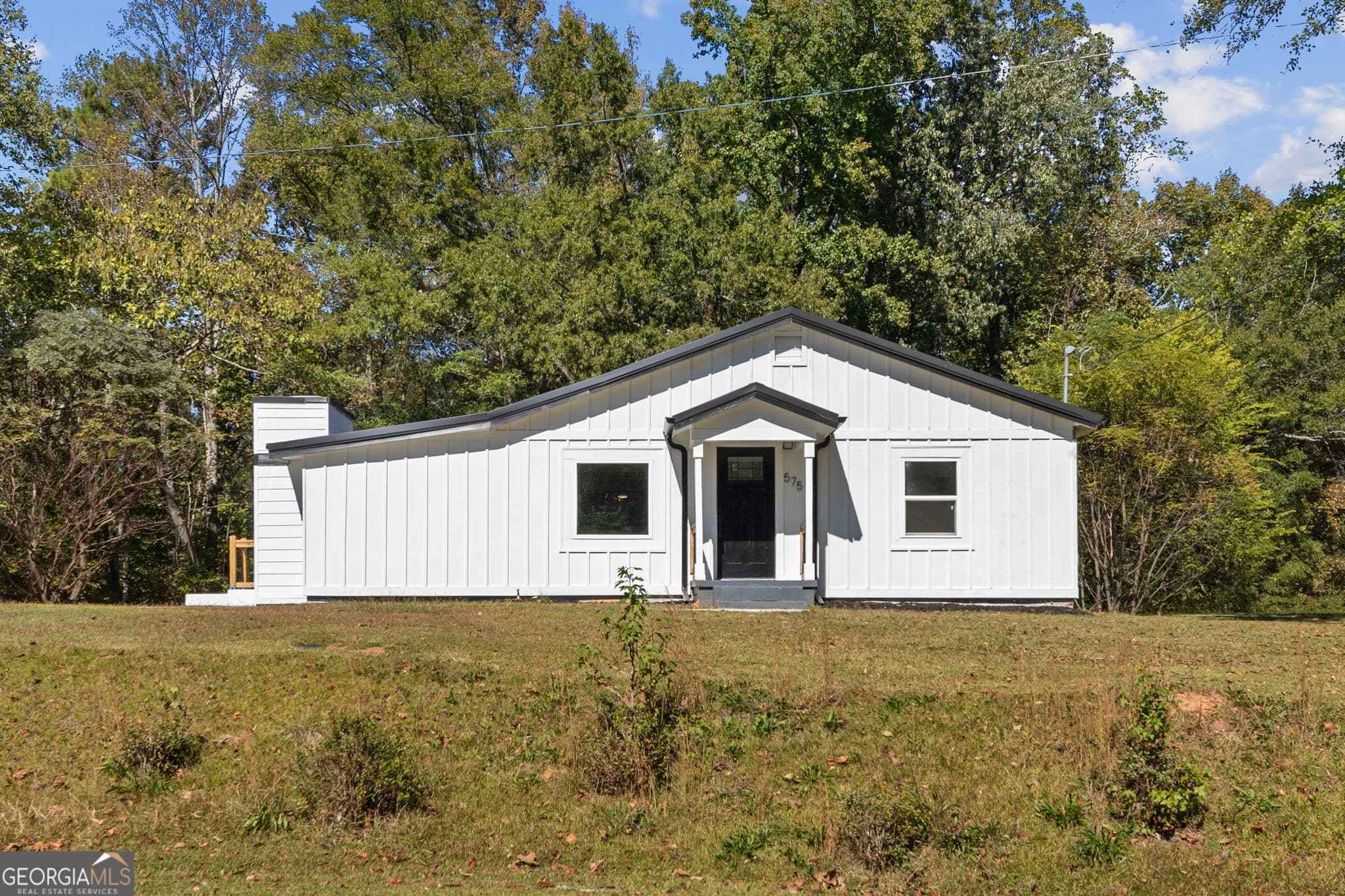 4 bedroom, 2 bathroom, 1,690 sq ft single family residence for sale at 575 Laurelwood Drive, Tyrone, GA 30290 — photo 3
