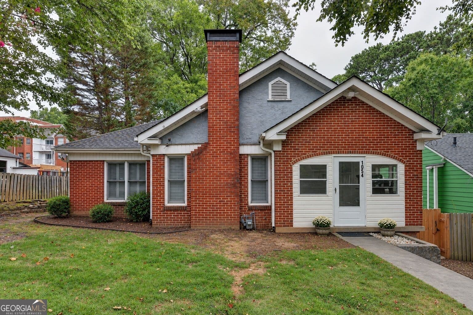 7 bedroom, 2.5 bathroom, 2,800 sq ft single family residence for sale at 1054 Atlantic Drive, Atlanta, GA 30318 — photo 1 of 62