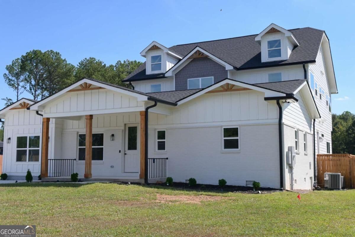 4 bedroom, 3 bathroom, 3,186 sq ft single family residence for sale at 518 Hoke Okelly Mill Road, Loganville, GA 30052 — photo 2