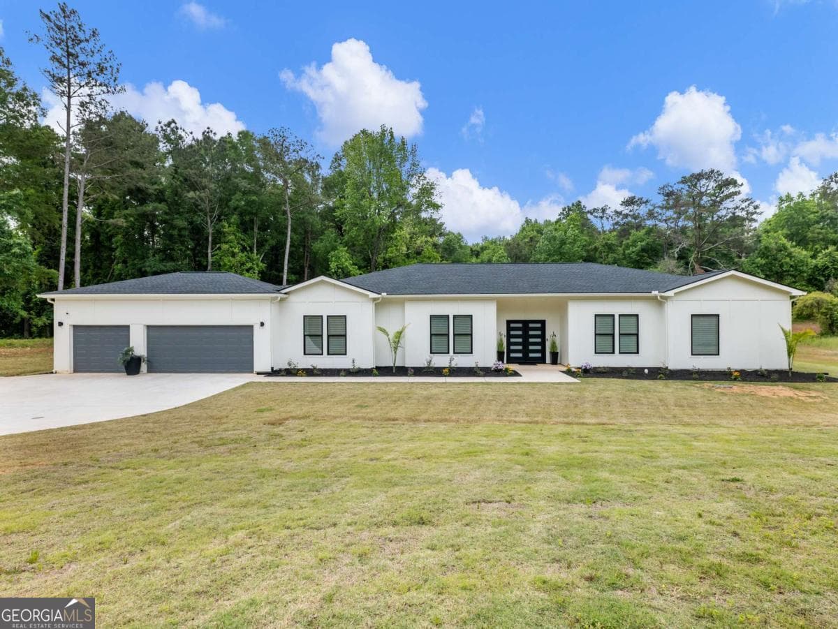5 bedroom, 3.5 bathroom, 3,668 sq ft single family residence sold at 586 Cook Drive, Ellenwood, GA 30294