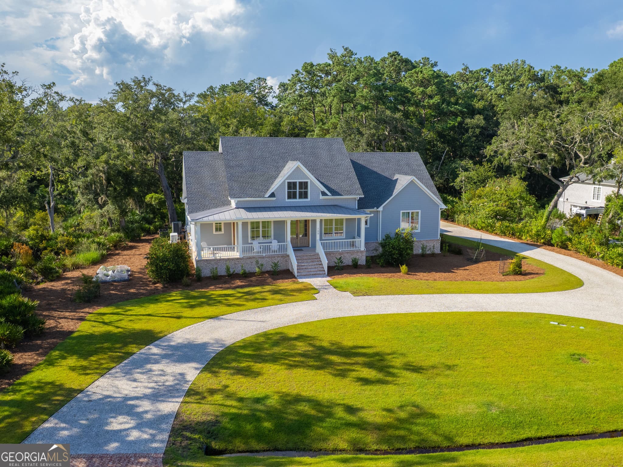 4 bedroom, 3.5 bathroom, 3,549 sq ft single family residence for sale at 105 Jones Creek Drive, St. Simons, GA 31522 — photo 2