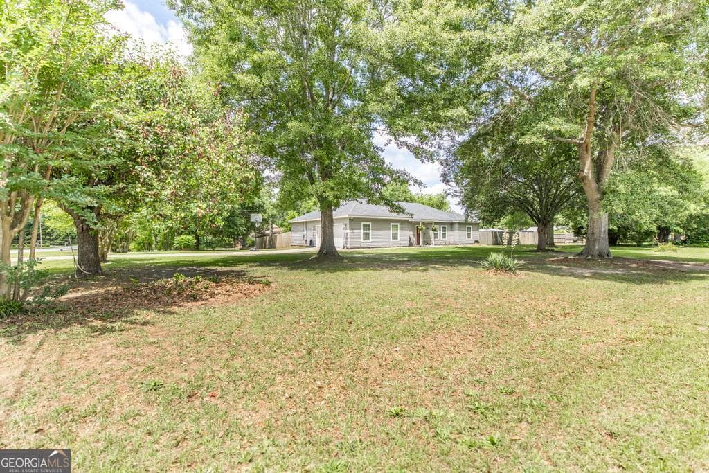 3 bedroom, 2 bathroom, 1,785 sq ft single family residence sold at 203 Franklin Street, Bonaire, GA 31005