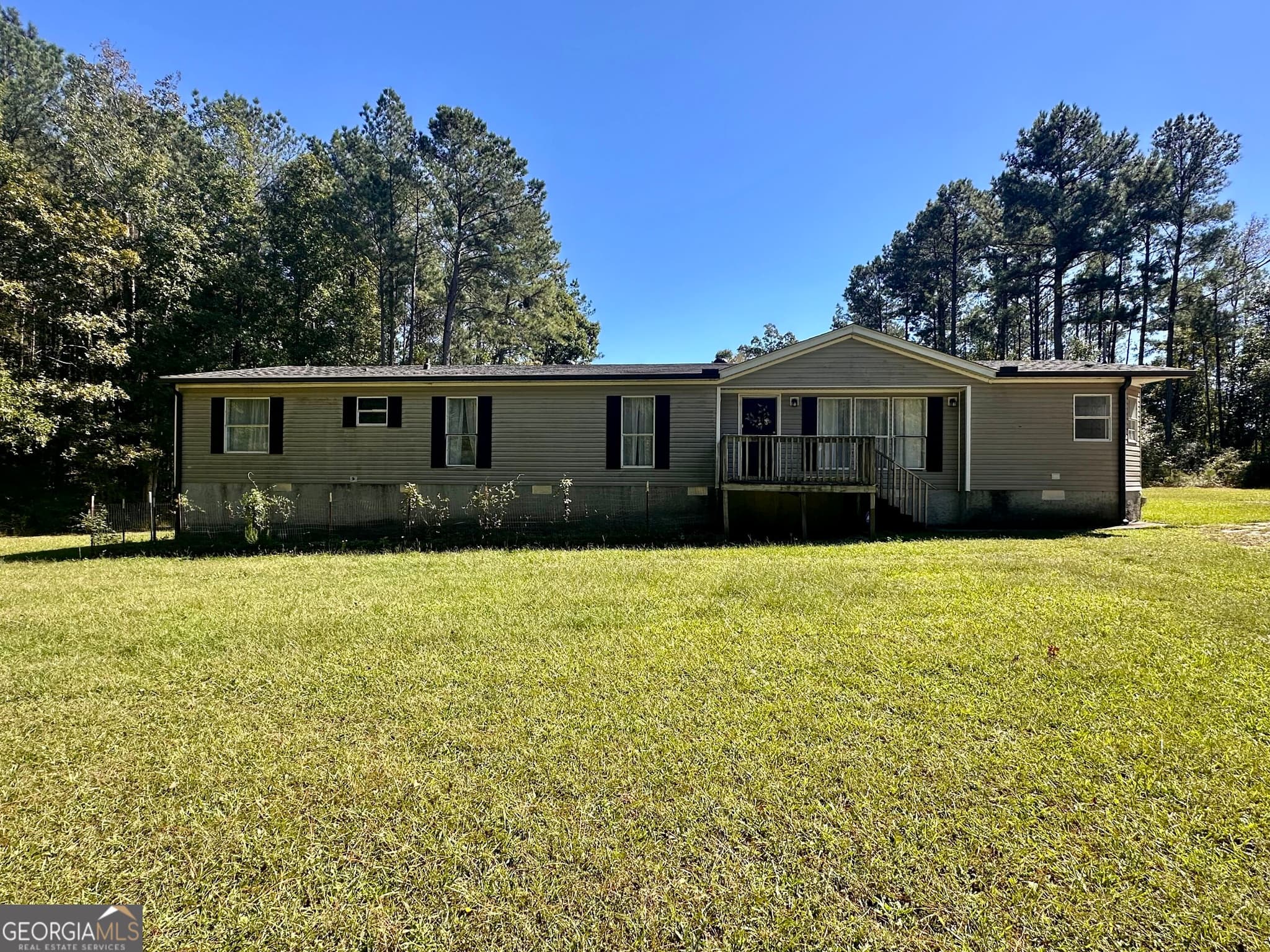 4 bedroom, 2 bathroom, 2,432 sq ft manufactured home,single family residence for sale at 293 Winding Way Drive, Jeffersonville, GA 31044